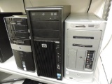 Five computer towers for parts or repair.