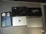 Five HP laptop computers for parts or repair.