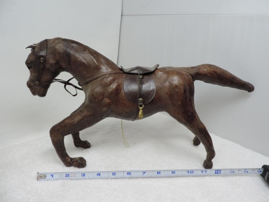 Cool antique leather horse.
