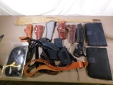 Holsters slings and cases