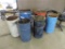 Six metal barrels.