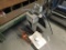 Strapping machine and stapler