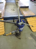 Manual oil pump and B&D angle grinder.