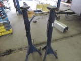 Two heavy duty rolling pipe stands.