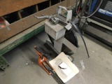 Strapping machine and stapler