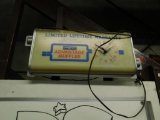 Walker Muffler shop clock