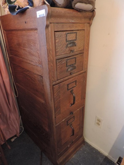 Antique globe file cabinet.