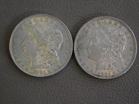 Two 1921 Morgan dollar coins