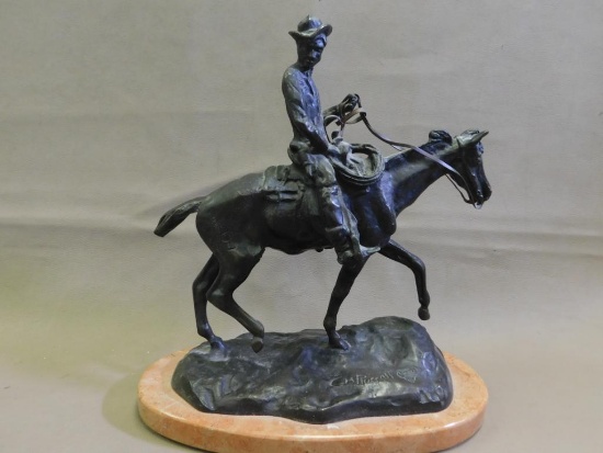 Charles Russel cowboy bronze statue