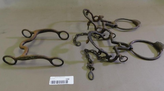 Three antique iron bits