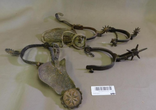 Four ear iron western spurs