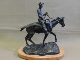 Charles Russel cowboy bronze statue