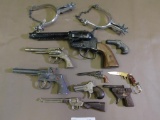 Western toy guns and Spurs