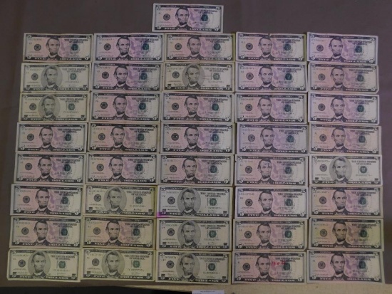 Forty one $5 bill US star notes