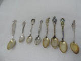Eight sterling collector spoons.