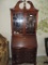 Drop front serpentine china cabinet.