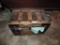 Antique trunk with wedding gown.