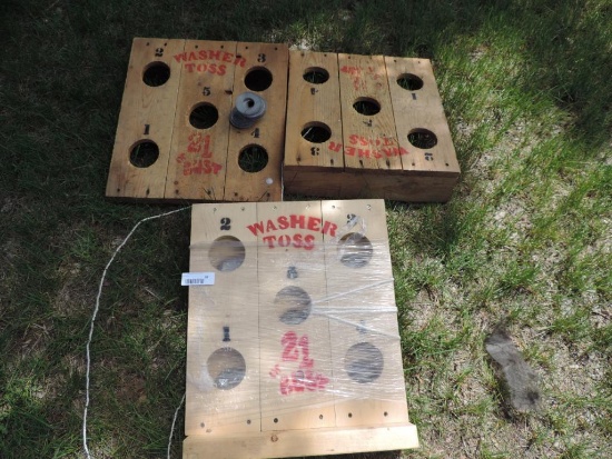 Two washer toss games.