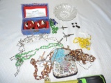 Religious costume jewelry and Chinese health balls.