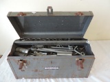 Rusty tool box loaded with Craftsman sockets.