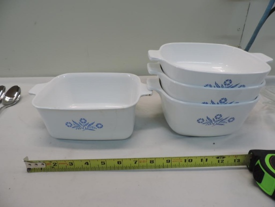 Four pieces of corningware.