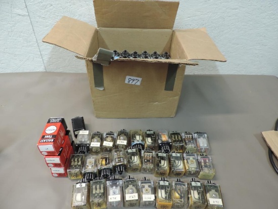 Box of 100+ plug in relays.