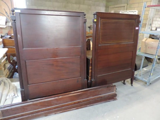 Pair of antique mahogany twin sized beds.