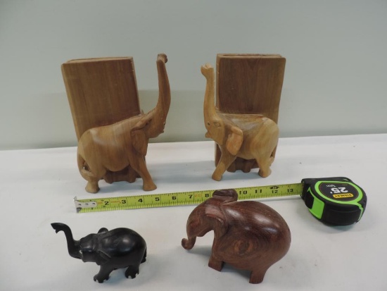 Carved elephant bookends.