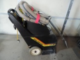 NSS Stalion 8 SC floor machine with wand attachment.