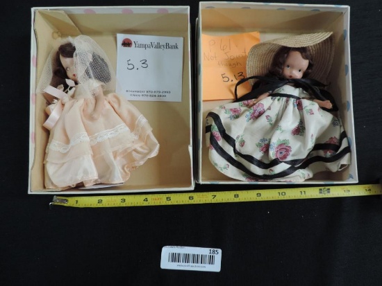Two Nancy Ann Storybook dolls.