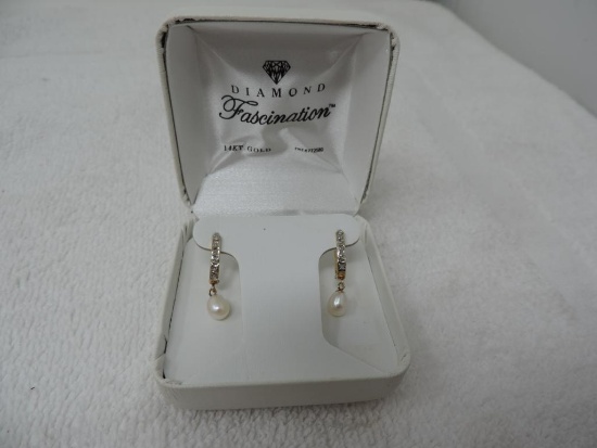 Beautiful 14K gold diamond - pearl earrings.