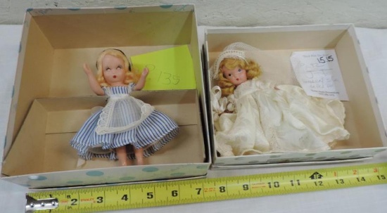 Two Nancy Ann Storybook dolls.