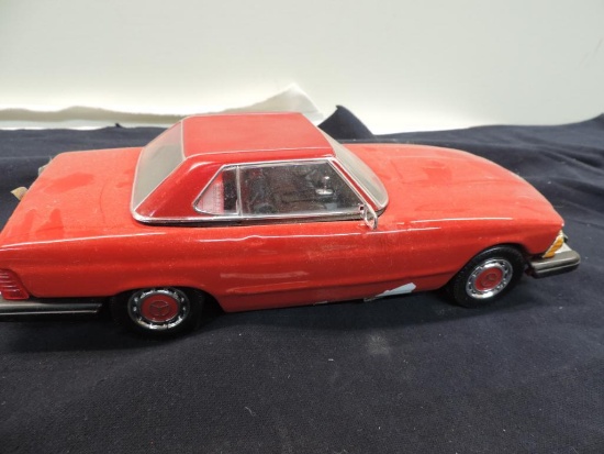 Full Mercedes 450 SL beam decanter.