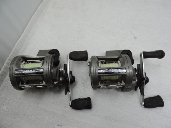 Two Daiwa 17LC bait cast reels.