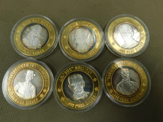 Six silver Western ingots