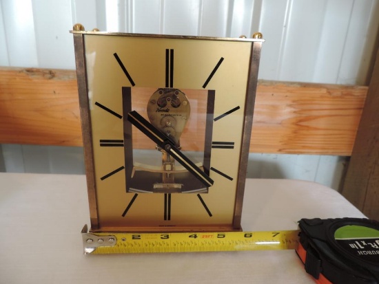 Kundo magnetic clock.