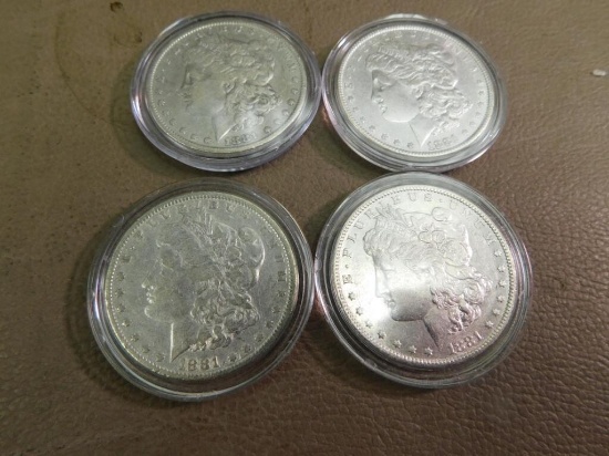 Four 1881 Morgan Silver Dollar coins