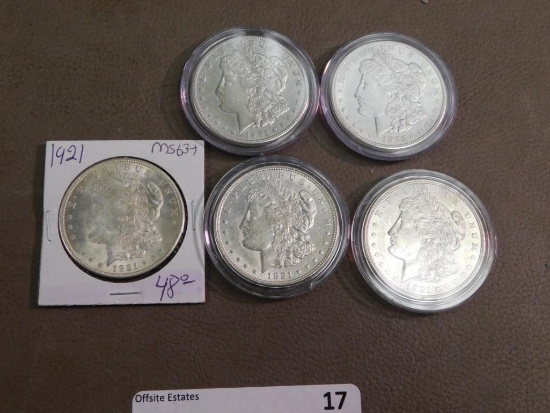 Five 1921 Morgan silver dollar coins