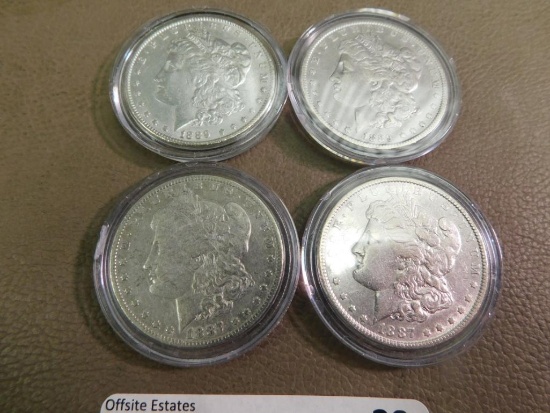 Four 1887 & 1889 Morgan silver dollar coins