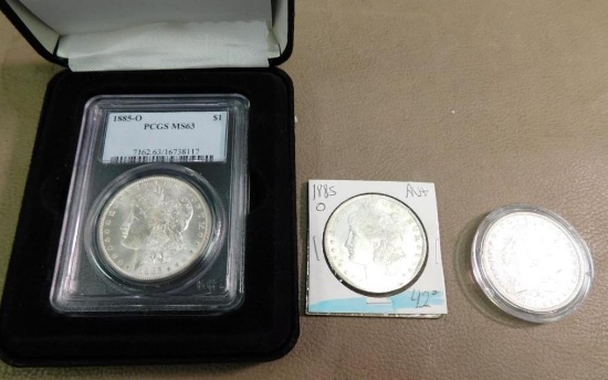 Three 1885 Morgan Silver dollar coins