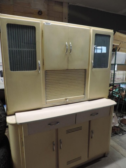 Cool Mid Century kitchen cabinet.