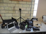 Large camera & elctronics assortment.
