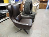 Faux leather modern chair.