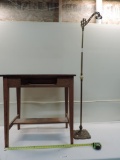 Ornate antique brass floor lamp - oak table.