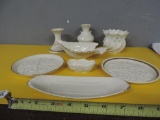 Seven pieces of lenox and a Beleek vase.