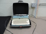 Powder Blue Smith Corona Coronet typewriter.