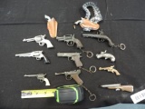 Toy pistol keychains.