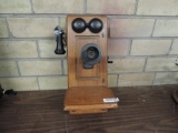 Antique wood cased Western Electric Wall phone.