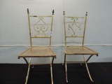 Two Italian made gold metal chairs.
