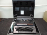 The Correct-o-sphere typewriter with case.
